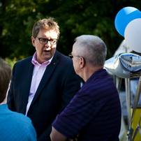 Ann Arbor resident David Wallner talks to another guest during the Ann Arbor Public Schools retirement party at Top of the Park on Tuesday, June 18. He is here to support his wife Louise who was the music teach at Bryant Elementary. Daniel Brenner I AnnArbor.com
